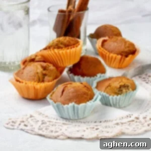 Irresistible Holiday Cinnamon Muffins 7 Warm and naturally sweetened Weight Watchers Cinnamon Muffins arranged on a plate.