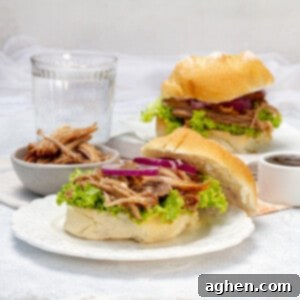 Tender and smokey BBQ pulled pork sandwiches.