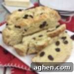 You will love this quick and easy Irish Soda Bread with Raisins recipe made with flour, baking soda, salt, sugar, egg, butter, buttermilk, and raisins for St. Patrick's Day or any time of year!