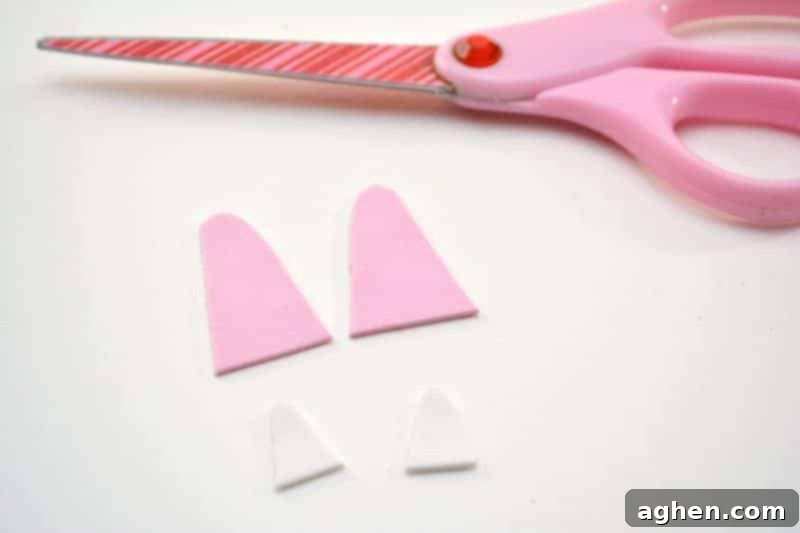 Step 3: Carefully cut out both the pink and white craft foam ear shapes.