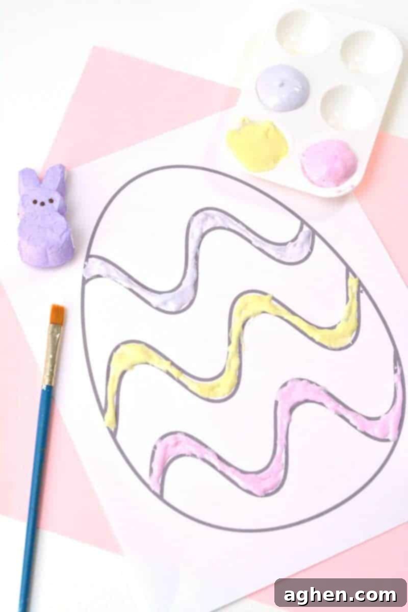 Close-up of a microwave-safe bowl containing melted Peeps marshmallow, stirred into a smooth, colorful puffy paint mixture.