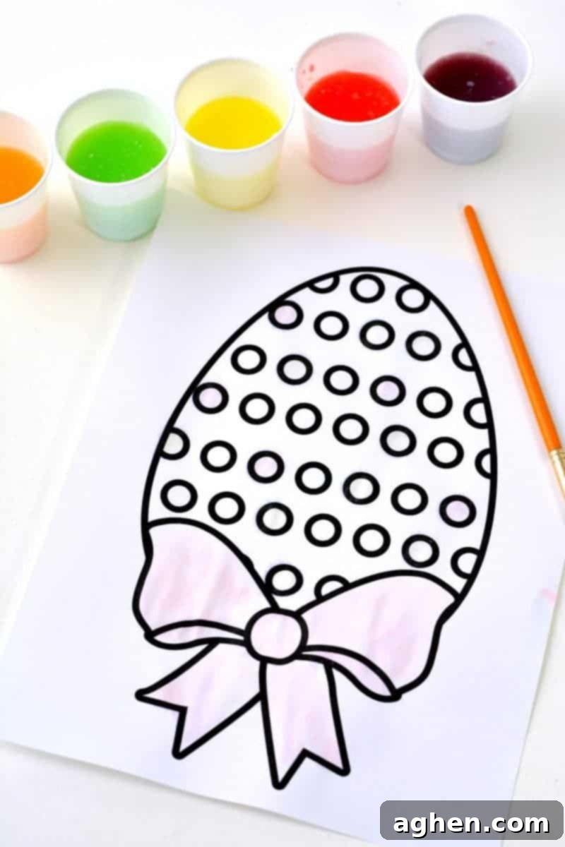 Looking for a fun Easter kids activity?! How about making 2-ingredient watercolor paint with Skittles candies?! See how to make skittles paints and download a free printable Easter egg coloring page.