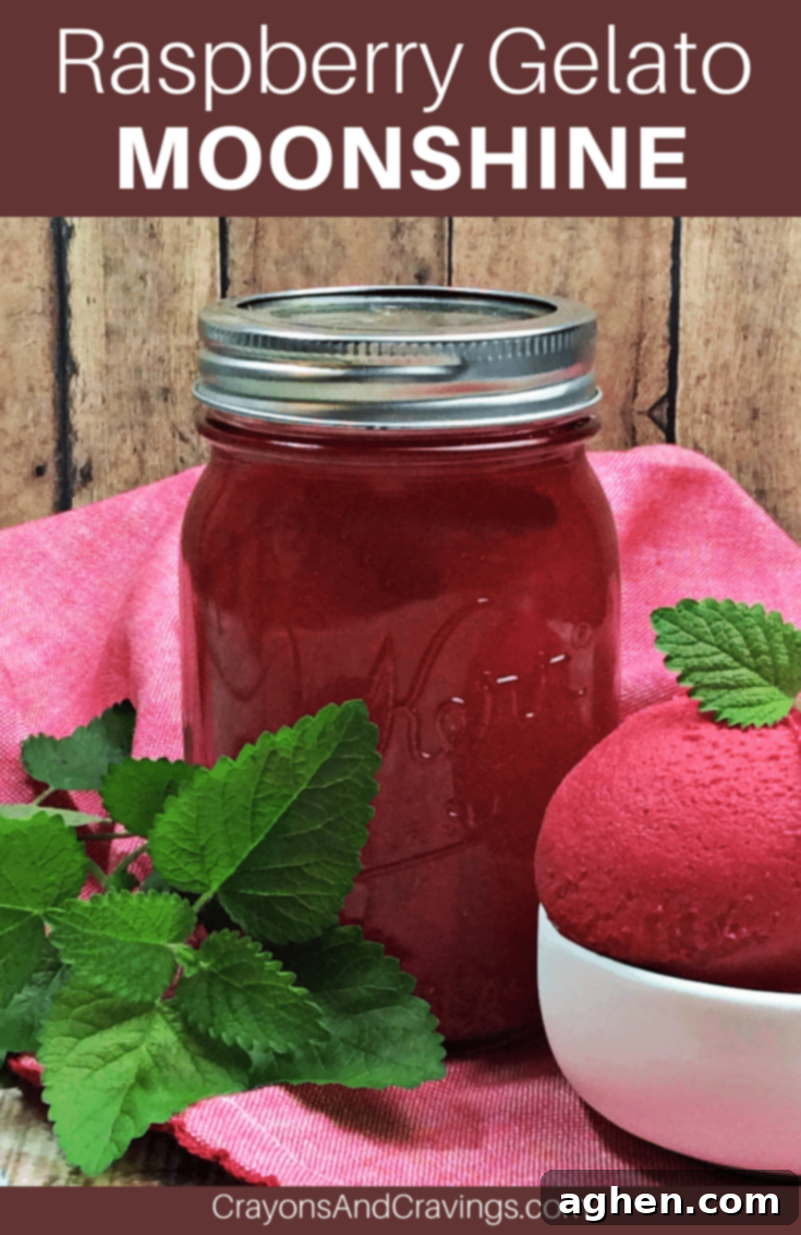 Pin this homemade Raspberry Gelato Moonshine recipe for later, featuring Everclear, fresh fruit, and sweet flavors.