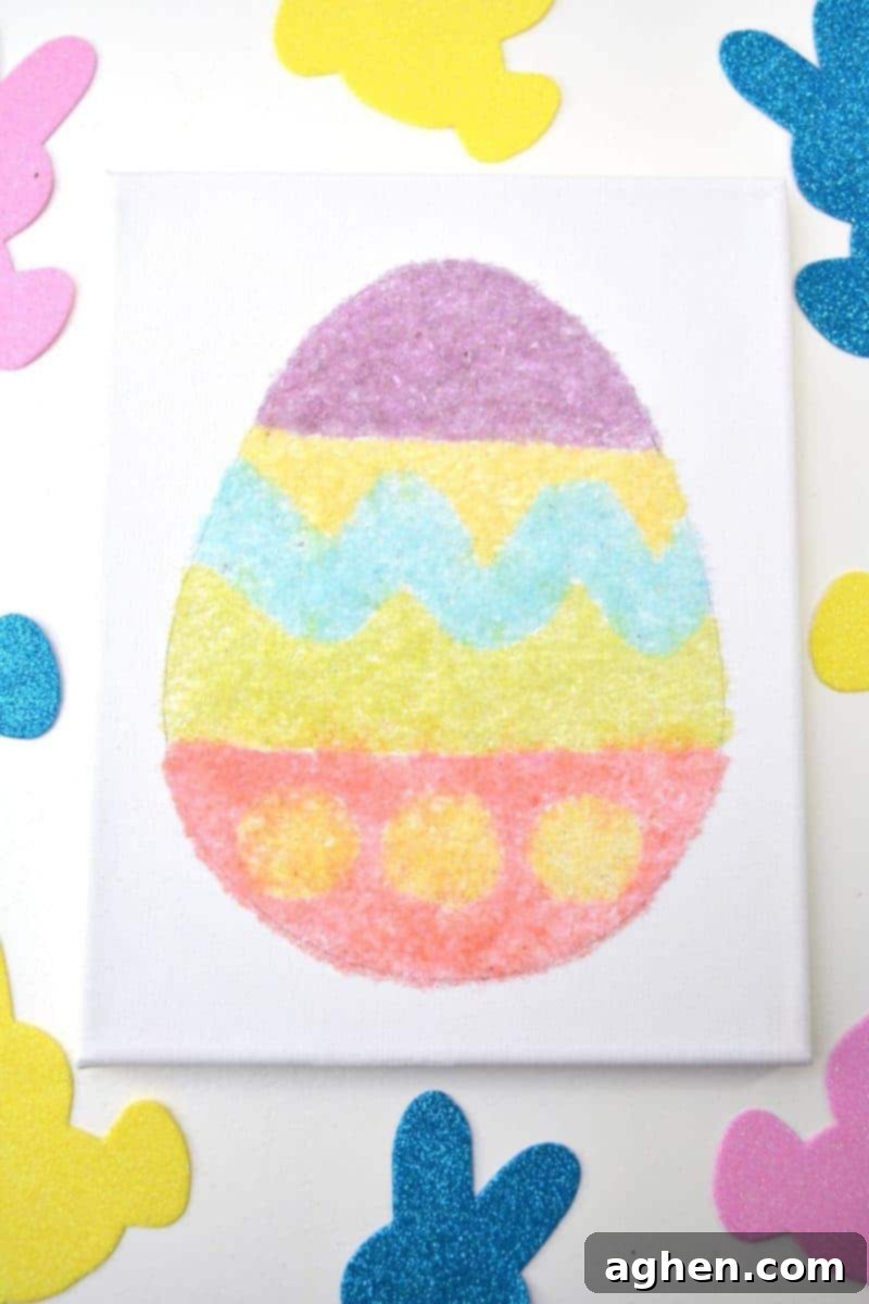 Close-up of a beautifully textured salt glitter Easter egg canvas art, ready for display.