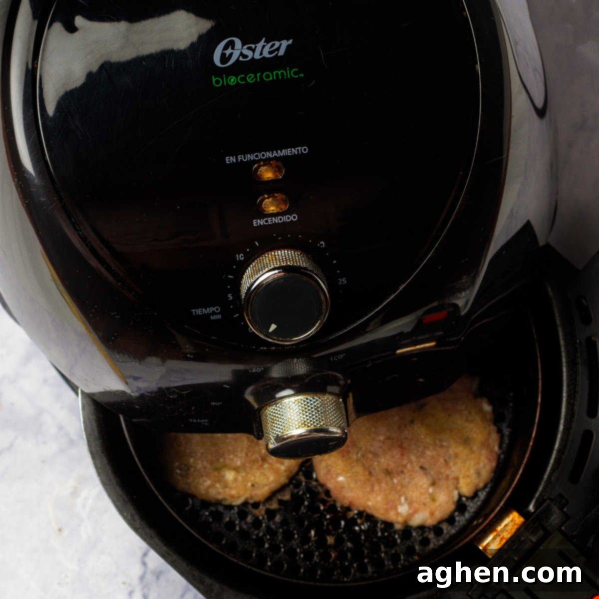 Cooking the turkey burger patties in an air fryer.