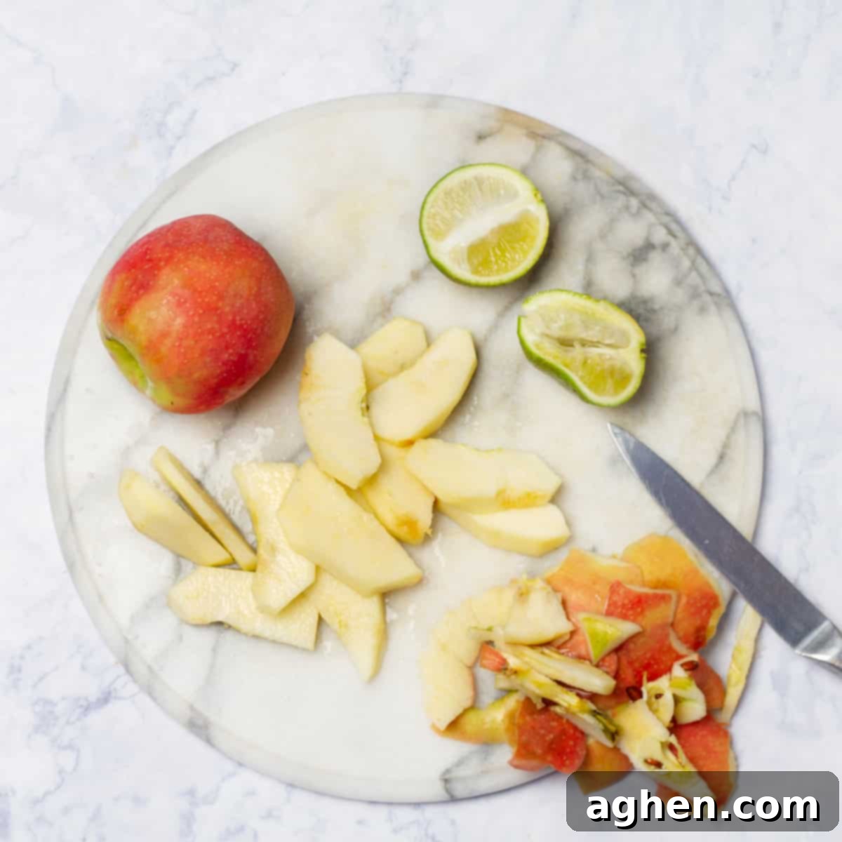 Slice and skin the apples, preparing them for sautéing.