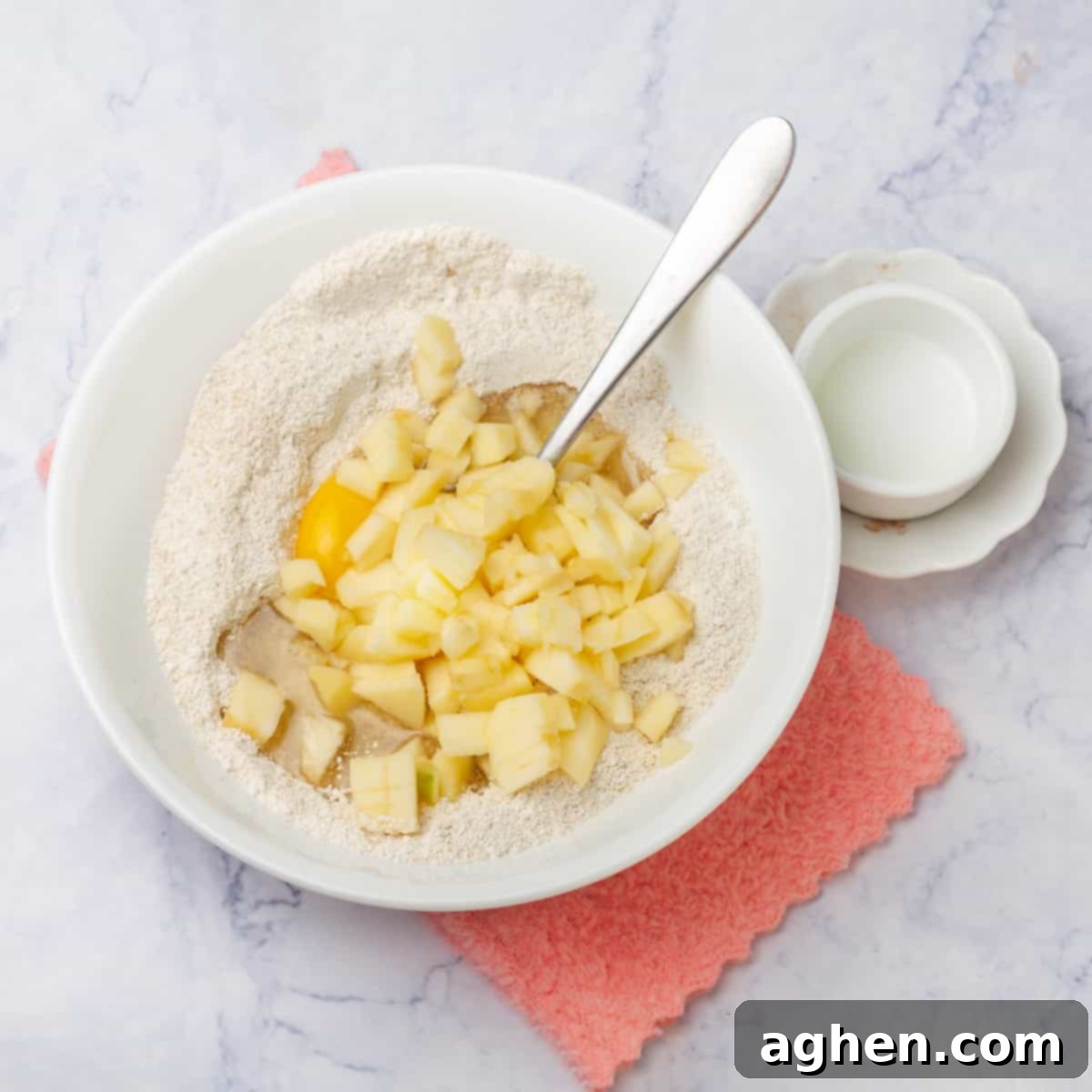 Guilt-Free Weight Watchers Apple Muffins 5 Diced apples and egg added to the dry ingredients and spices.