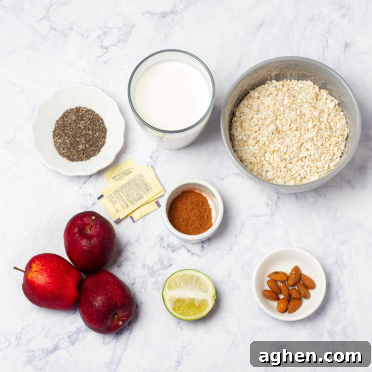 Simple Satisfying Apple Overnight Oats Breakfast Perfection 3 Apples, oats, chia seeds, milk, spices, and sweetener in separate dishes.