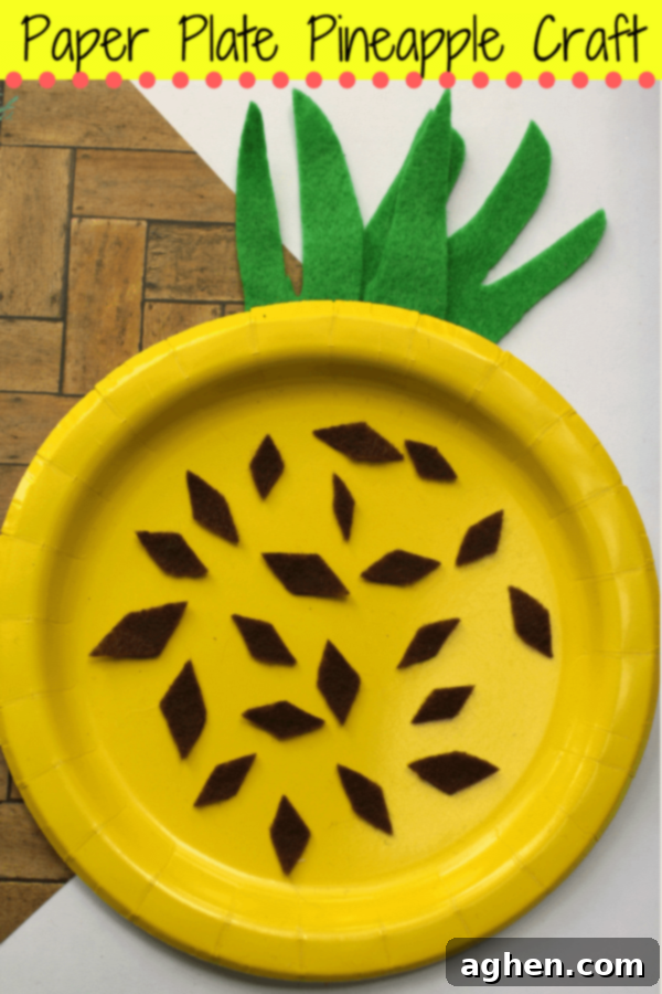 Pinterest-friendly vertical image of the finished paper plate pineapple craft with text 'Paper Plate Pineapple Craft for Kids - Easy Summer Fun!' inviting users to pin.