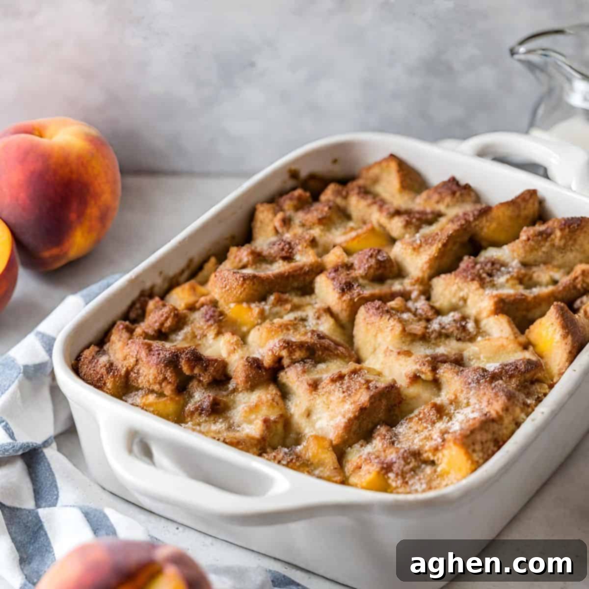 Guilt-Free Holiday French Toast Casserole 2 French Toast Casserole in White Baking Dish, ready to be served for a holiday brunch