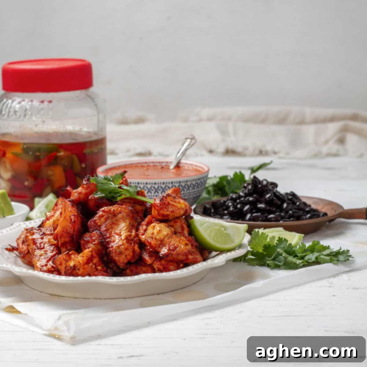 Perfectly grilled Chicken al Pastor garnished with fresh cilantro and a lemon slice
