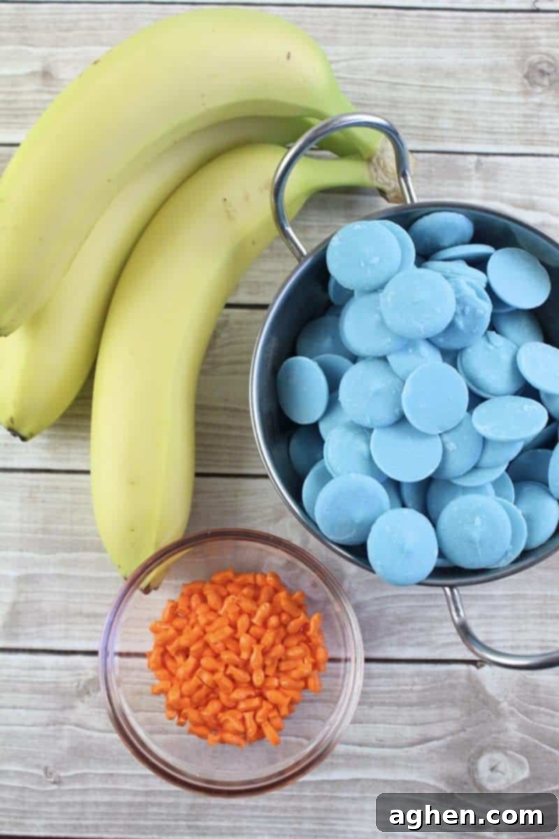 Ingredients for Under the Sea Banana Treats: blue candy melts, fish sprinkles, and fresh bananas.