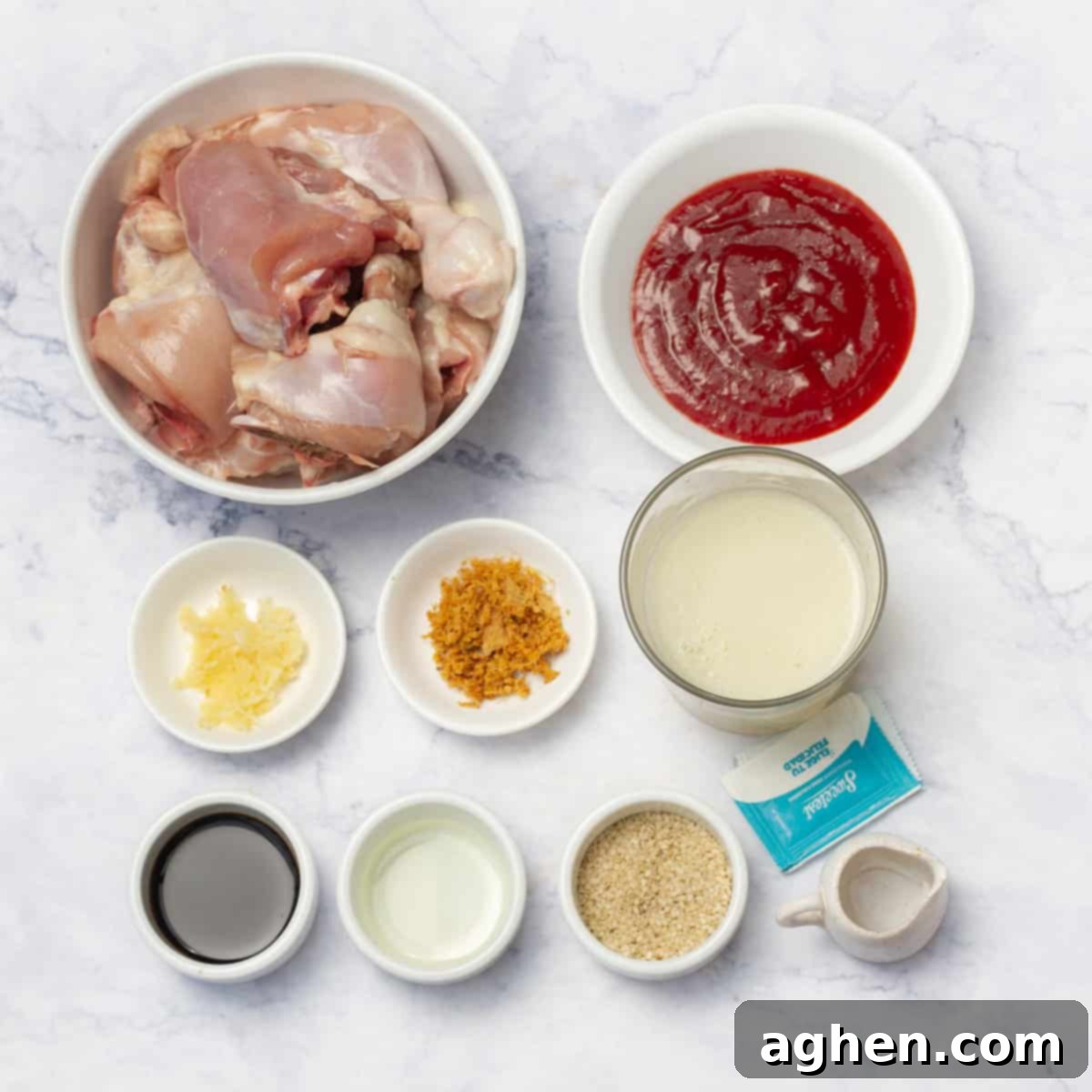 Huli Huli Chicken A Wholesome Hawaiian Legacy 3 Huli Huli chicken ingredients of chicken thighs, light tomato sauce, stevia, soy sauce, pineapple juice, vinegar, garlic, ginger, black pepper, oil, and sesame seeds in separate dishes.