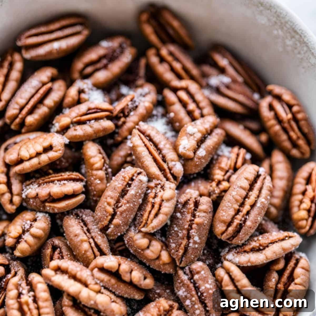 Preparing pecans for sweet potato casserole topping, showing chopped nuts and spices
