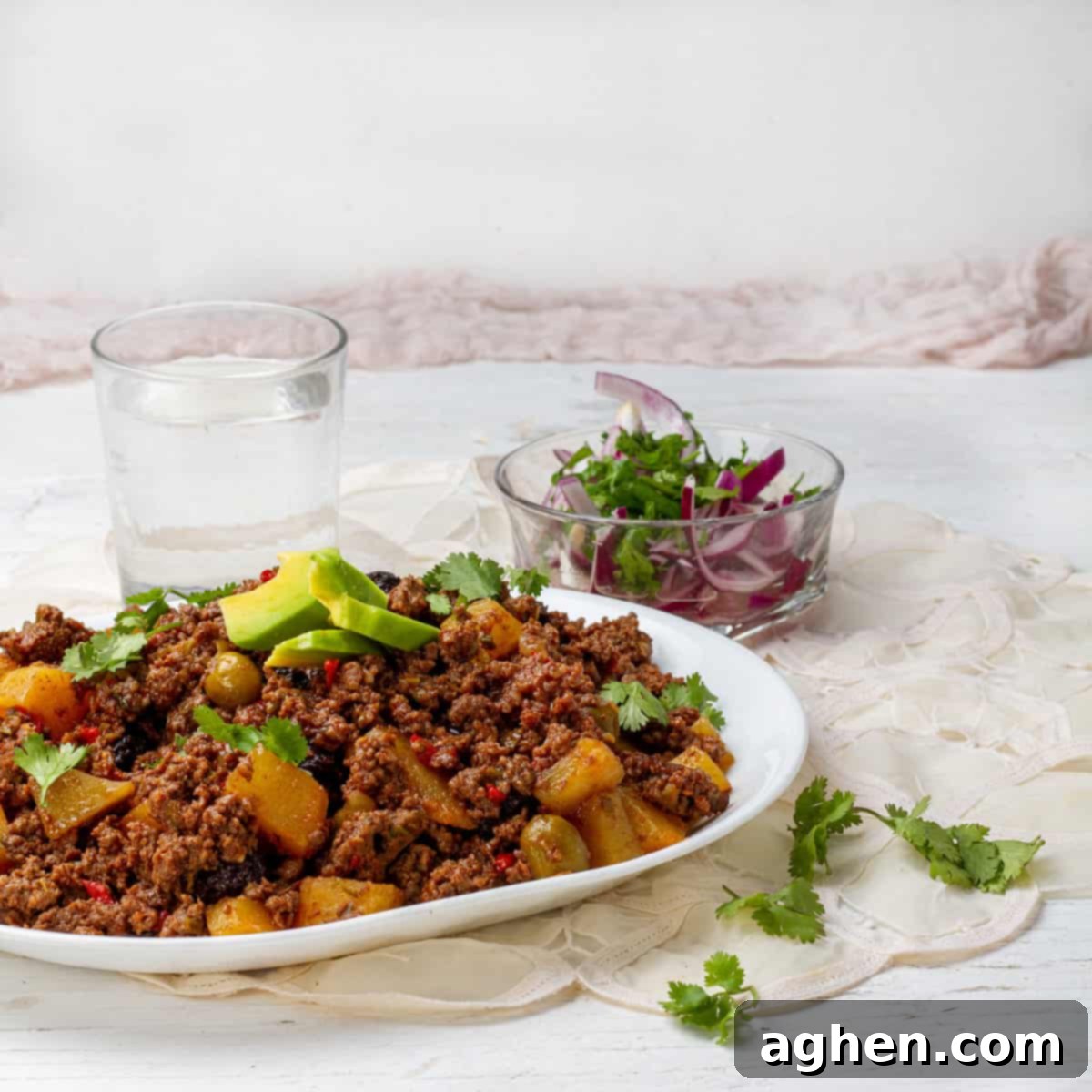 Cuban Picadillo served with salad and dressing of Avocados slices