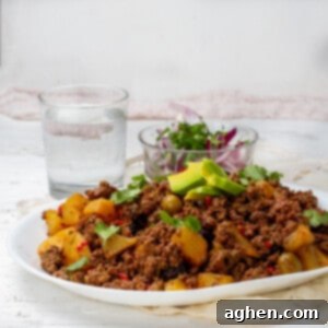 Cuban Picadillo served with salad and dressing of Avocados slices
