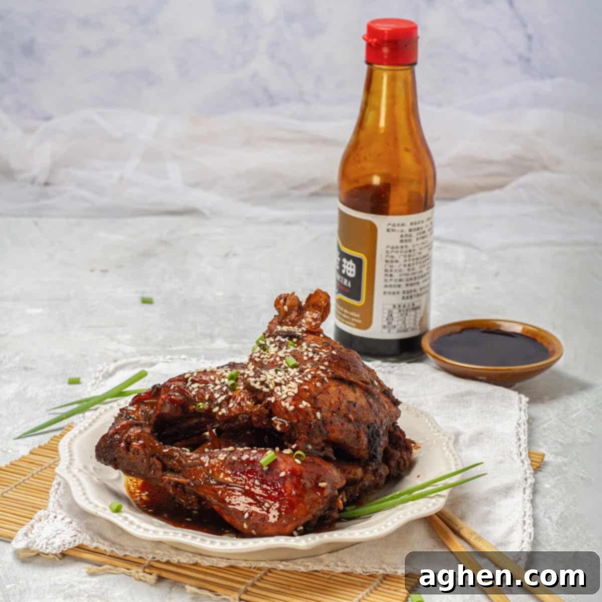 Experience the Authentic Filipino Chicken Adobo 2 Filipino Chicken Adobo served with sauce and wine