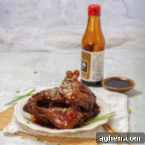 Experience the Authentic Filipino Chicken Adobo 8 Filipino Chicken Adobo served with sauce and wine