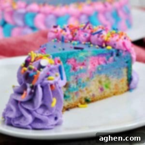 Whimsical Unicorn Cheesecake 5 Unicorn Cheesecake, a magical dessert with funfetti cake and colorful cheesecake layers.