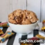Creamy homemade chocolate twix ice cream is an easy to make indulging frozen treat perfect for summer or anytime of the year.