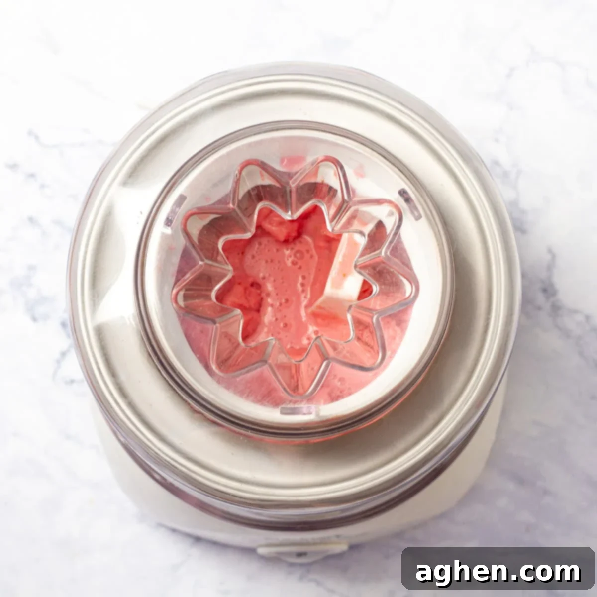 Strawberry Yogurt Ice Cream Mixture Poured into a Glass Container for Freezing