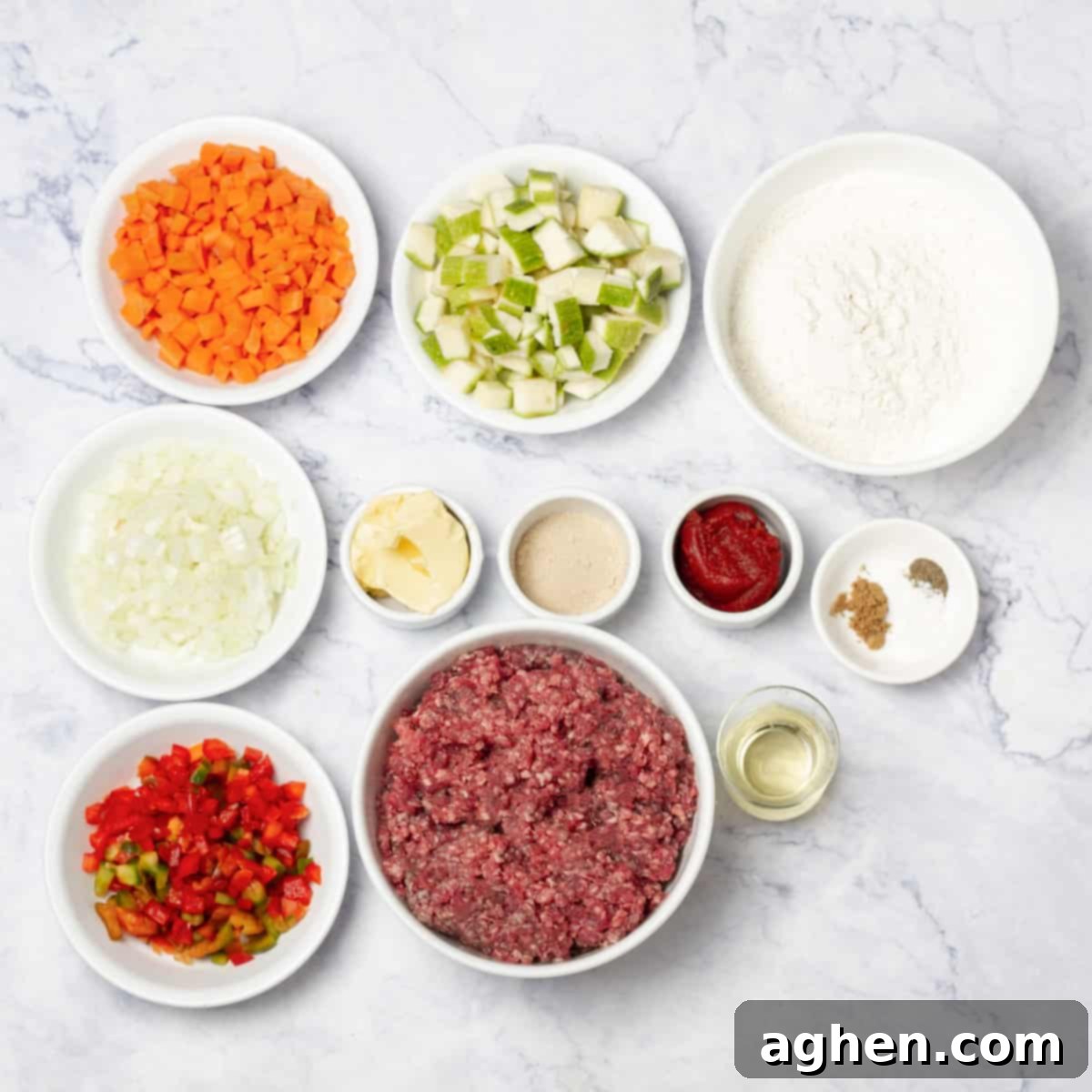Warm Up Cold Nights with a Hearty Beef Pie 3 Assorted beef pie ingredients: flour, yeast, butter, fresh vegetables, lean ground beef, tomato paste, and various seasonings arranged neatly.