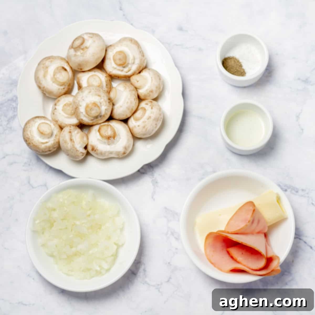 Guilt-Free Stuffed Mushrooms 3 Ingredients of whole mushrooms, diced onion, smoked turkey, and seasonings in separate dishes.