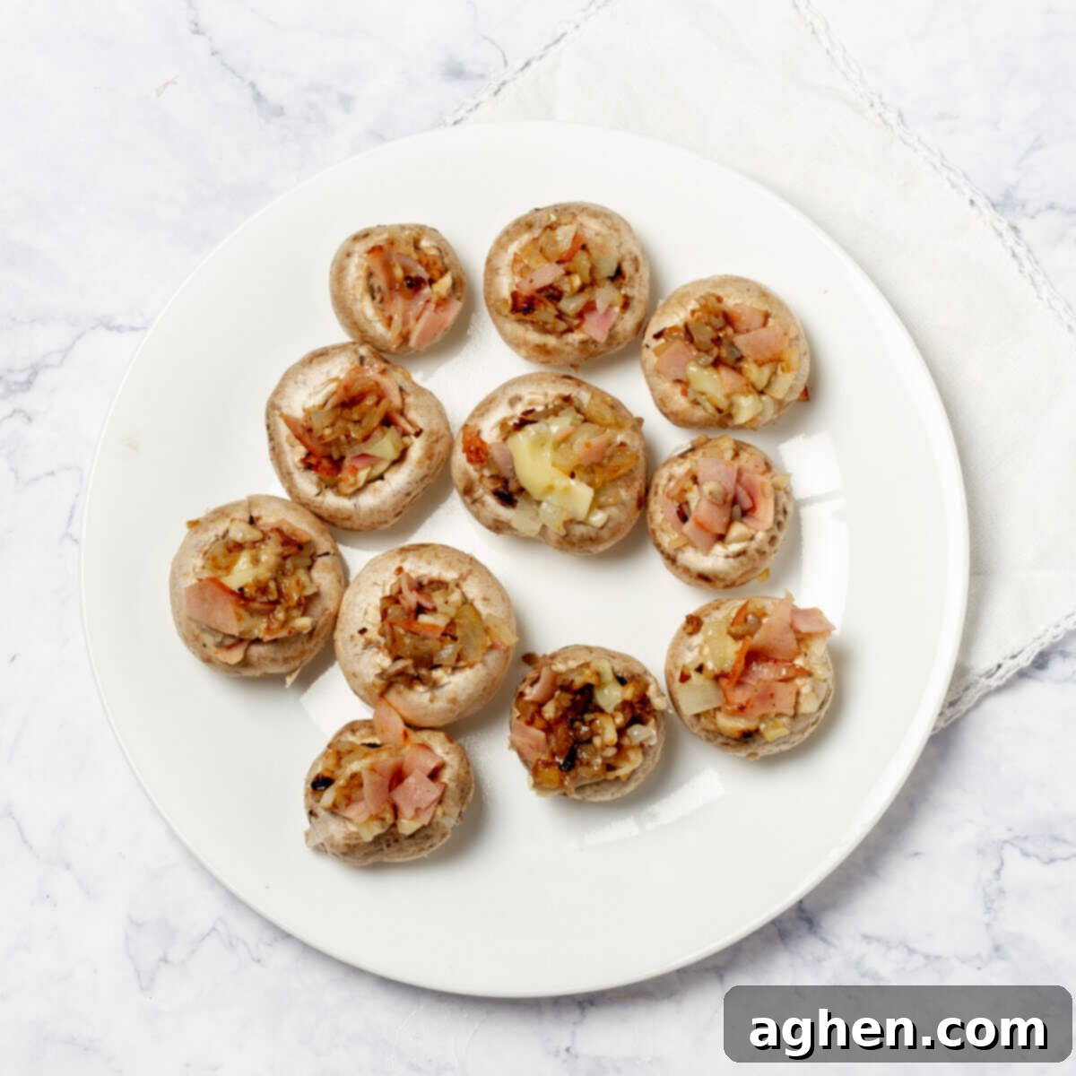 Guilt-Free Stuffed Mushrooms 6 Mushroom caps stuffed with cooked filling.