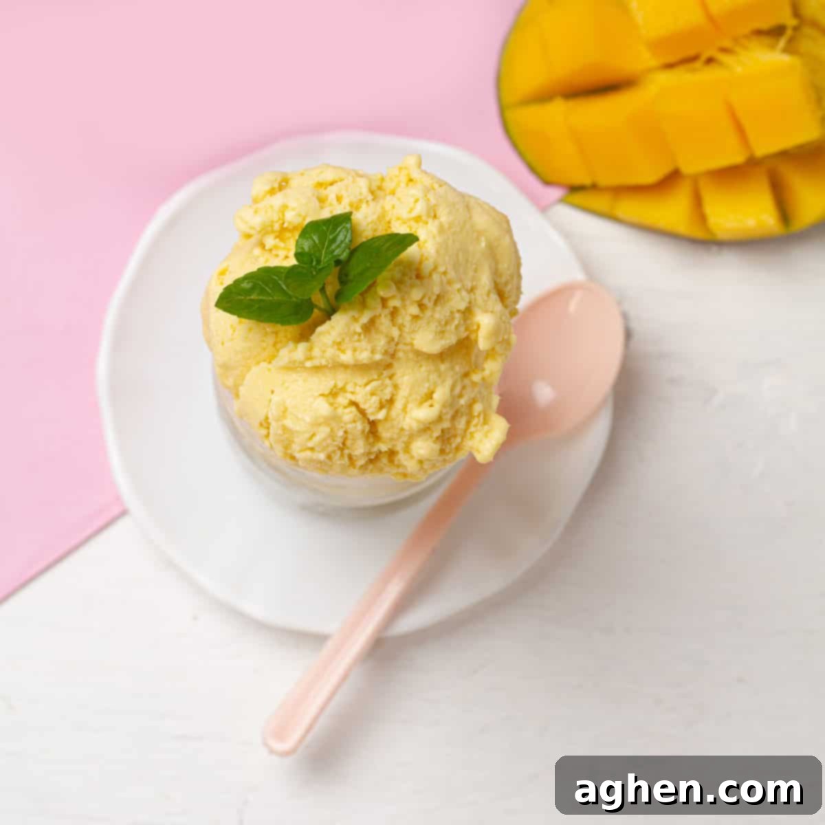 Tropical Mango Coconut Delight 8 Scoops of Creamy Mango and Coconut Ice Cream served in a bowl, ready to enjoy.