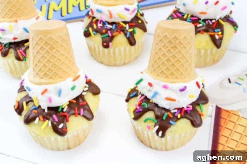 A charming display of finished upside-down melting ice cream cone cupcakes ready to be served.