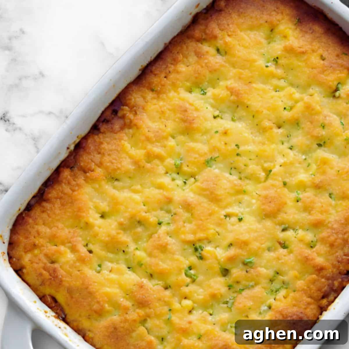 My Weight Watchers Jiffy Corn Casserole Recipe 2 Weight Watchers friendly Jiffy corn casserole in a white baking dish, golden brown and bubbly.