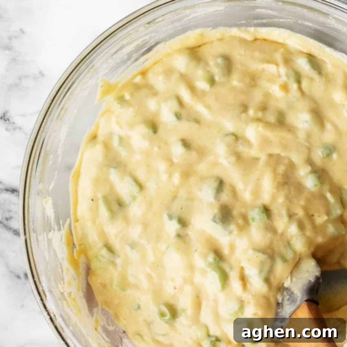 My Weight Watchers Jiffy Corn Casserole Recipe 4 Mixing bowl with ingredients for Jiffy corn casserole, showcasing the creamy texture before baking.