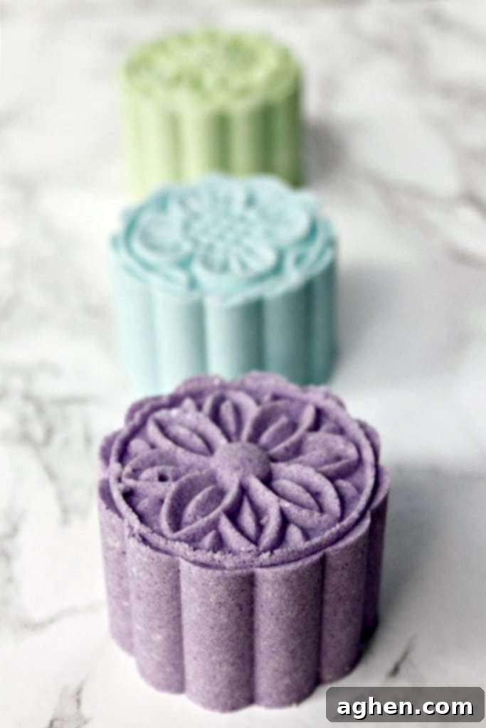Discover how to make beautiful homemade bath bombs easily using an elegant moon cake press.