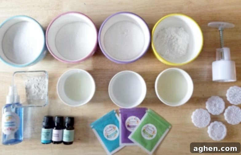 All the necessary supplies for making Moon Cake Press Bath Bombs laid out.
