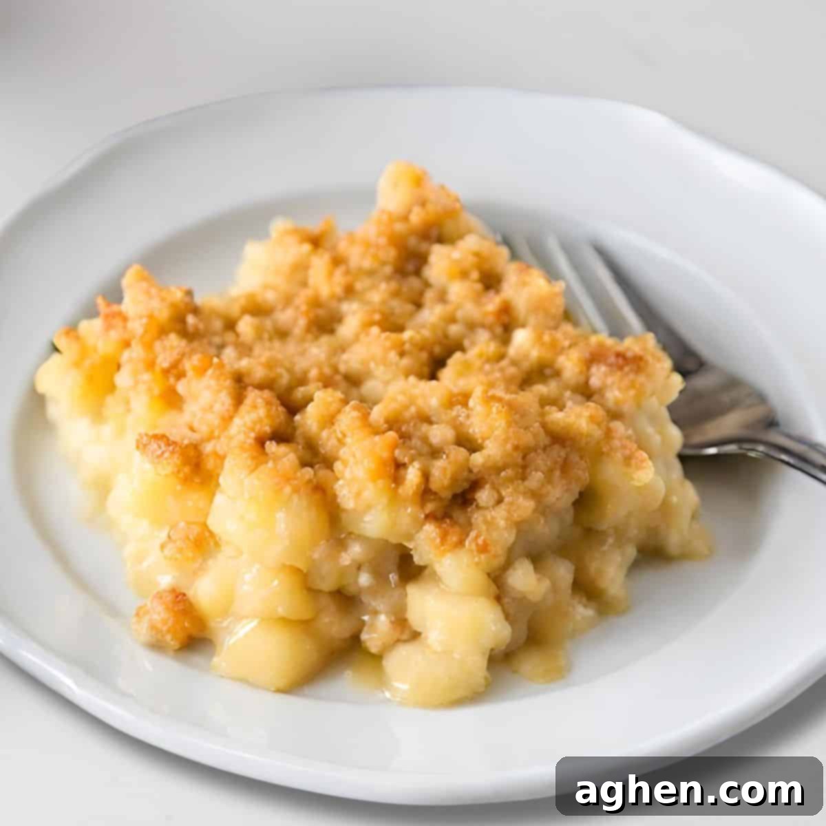 Guilt-Free Sweetness: Weight Watchers Pineapple Casserole 2 piece of pineapple casserole on white plate