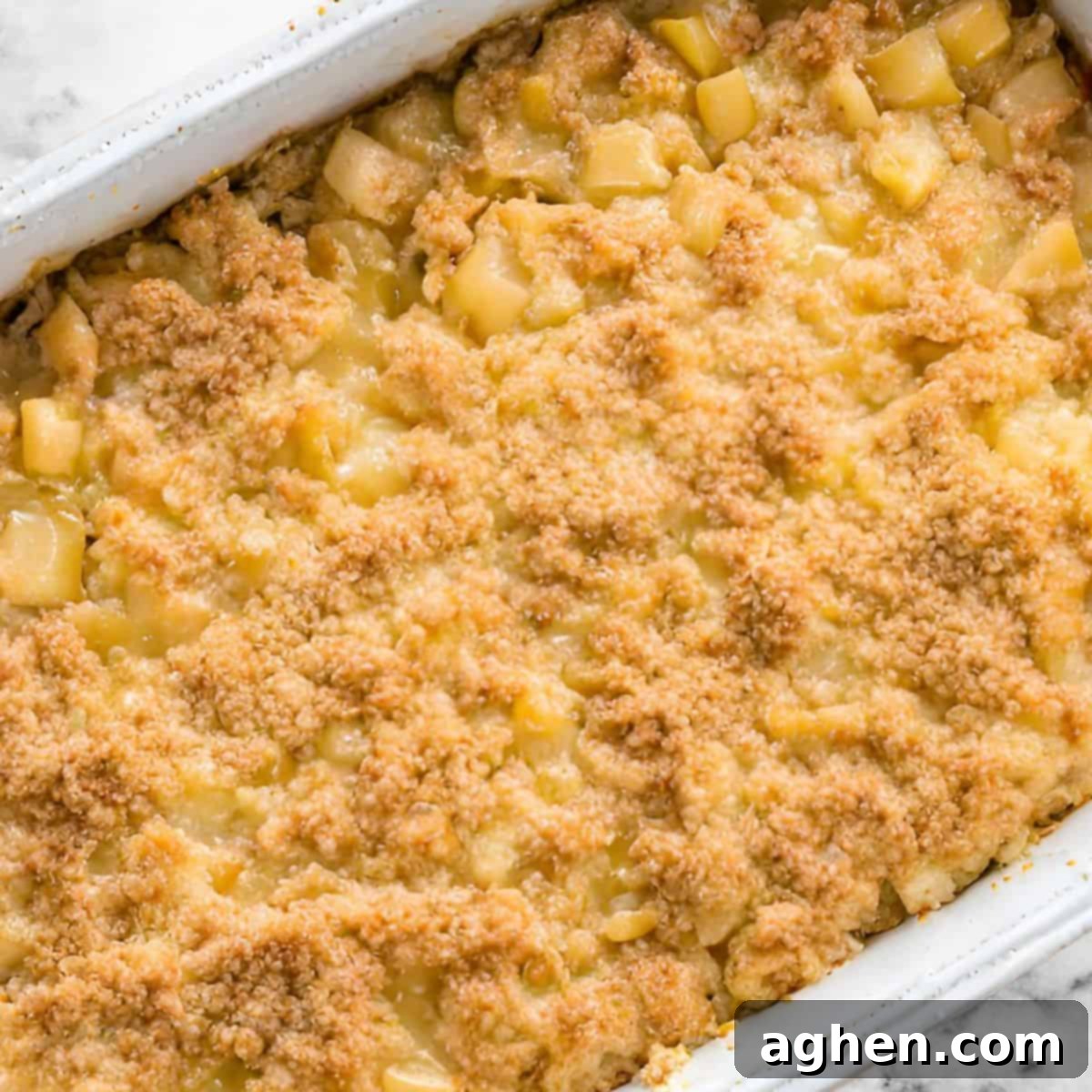 Guilt-Free Sweetness: Weight Watchers Pineapple Casserole 3 pineapple casserole in white casserole dish fresh out of the oven