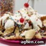 Ice cream sundae on top of a bed of broken ice cream cones.