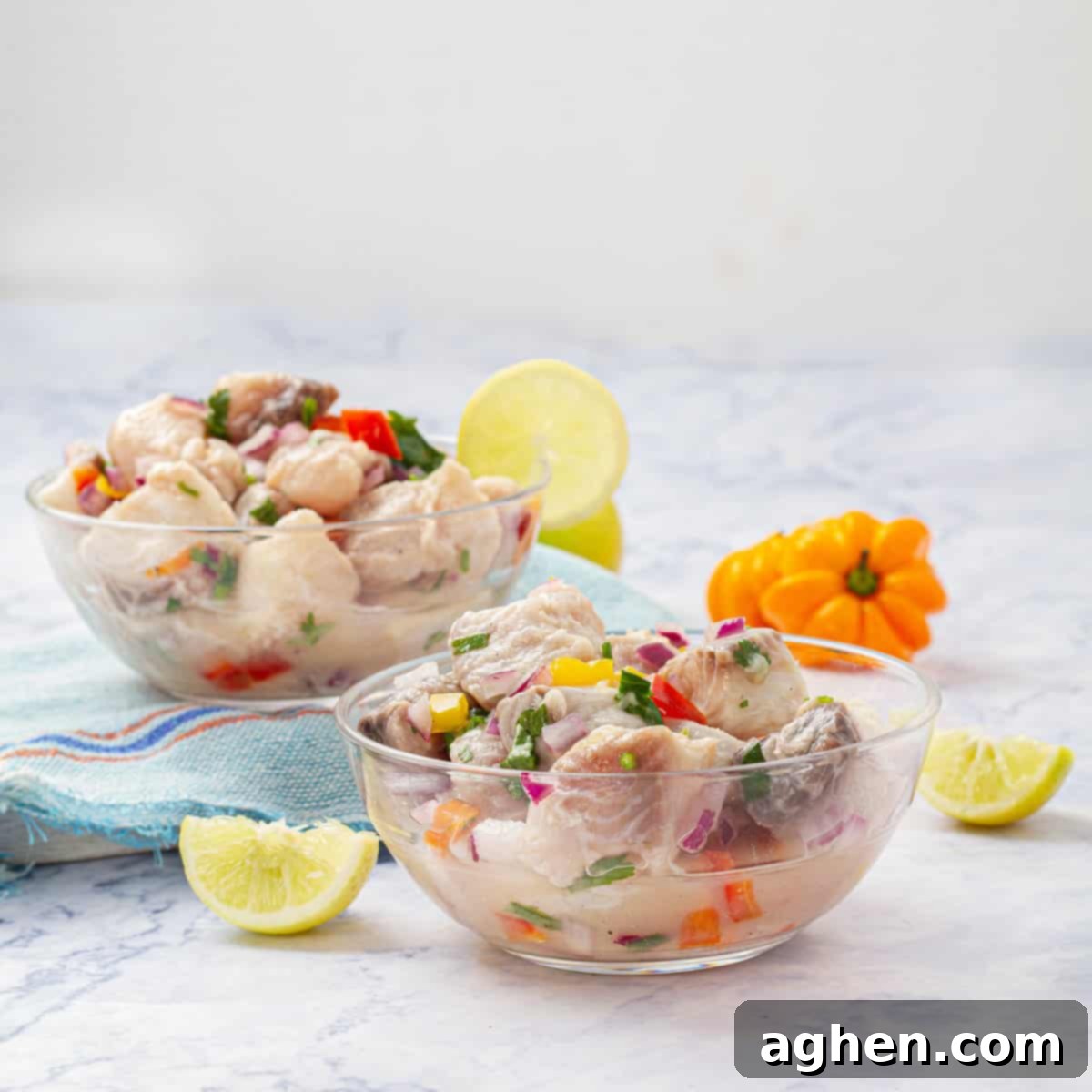 Two bowls of Ceviche served, garnished with fresh cilantro, ready to be enjoyed as a healthy and flavorful meal.