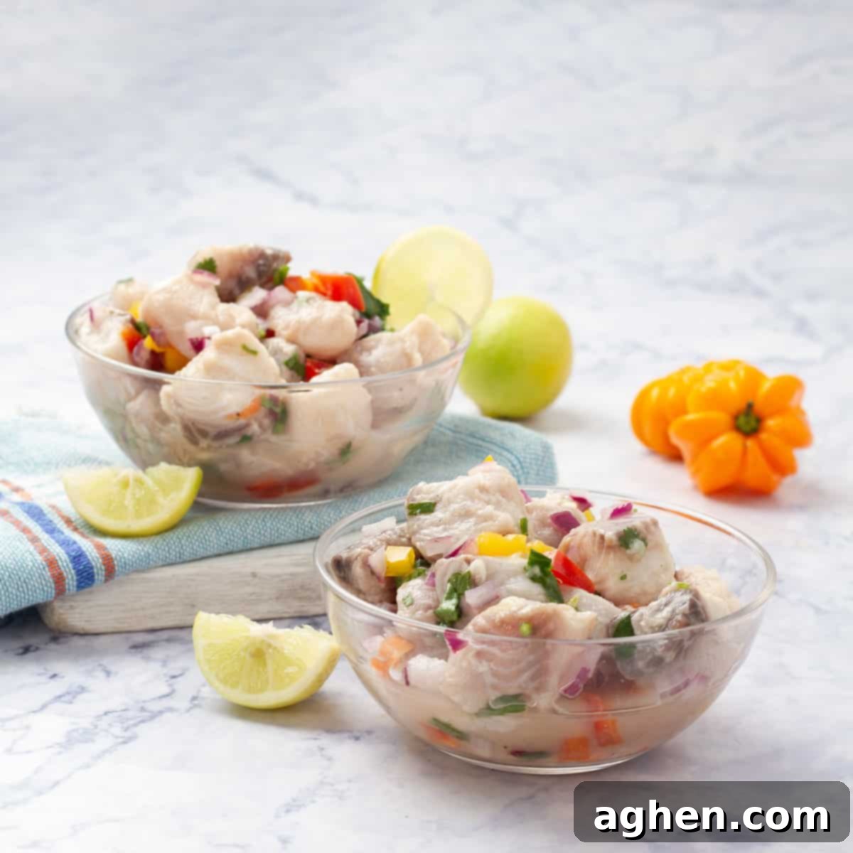Two beautifully plated bowls of Ceviche, garnished with fresh cilantro, showcasing the vibrant and refreshing appeal of the finished dish.