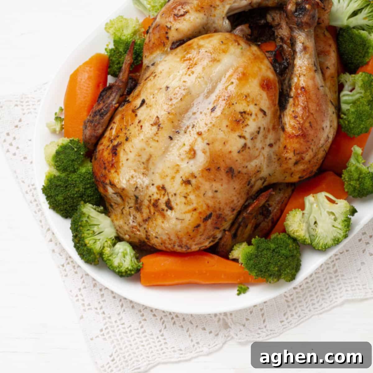 Instant Pot Whole Chicken served on a platter, garnished with fresh herbs