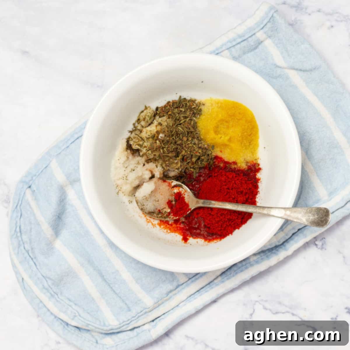 Instant Pot Whole Chicken spices mixed in a bowl, forming a paste
