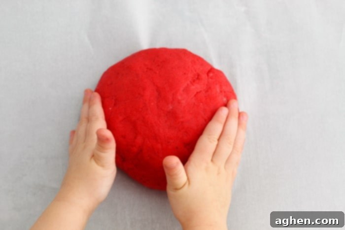 A non-toxic, taste-safe, apple scented playdough recipe perfect for Fall sensory play at home or in the classroom.