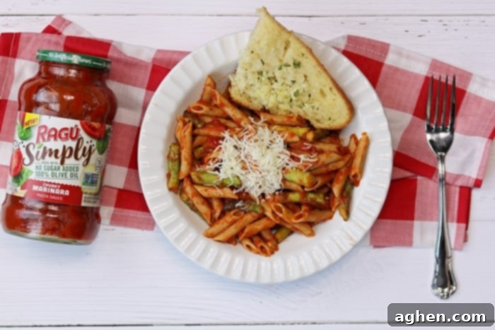 Easy Weeknight Pasta with Asparagus and Marinara Sauce, a family-friendly dinner idea.