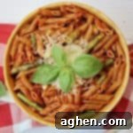 Whole wheat pasta with asparagus and marinara sauce is a quick and easy weeknight dinner option that the whole family will enjoy.