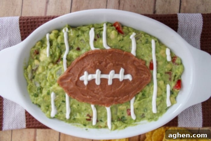 Homemade guacamole styled as a football field, a perfect game day snack or appetizer for any football gathering. This easy recipe makes a must-have dip!