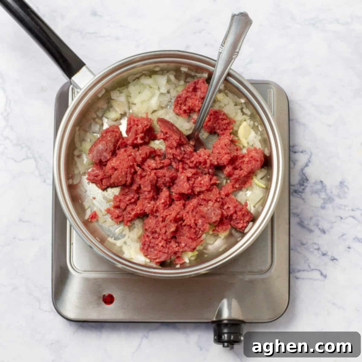 Instant Pot Stuffed Peppers Your Busy Weeknight Dream 5 Skillet on stove with lean ground beef and fried onion