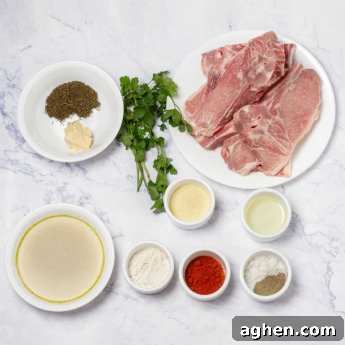 Juicy Instant Pot Pork Chops in Minutes 3 Chicken broth, garlic powder, onion powder, dried thyme, and smoked paprika arranged next to a small bowl.