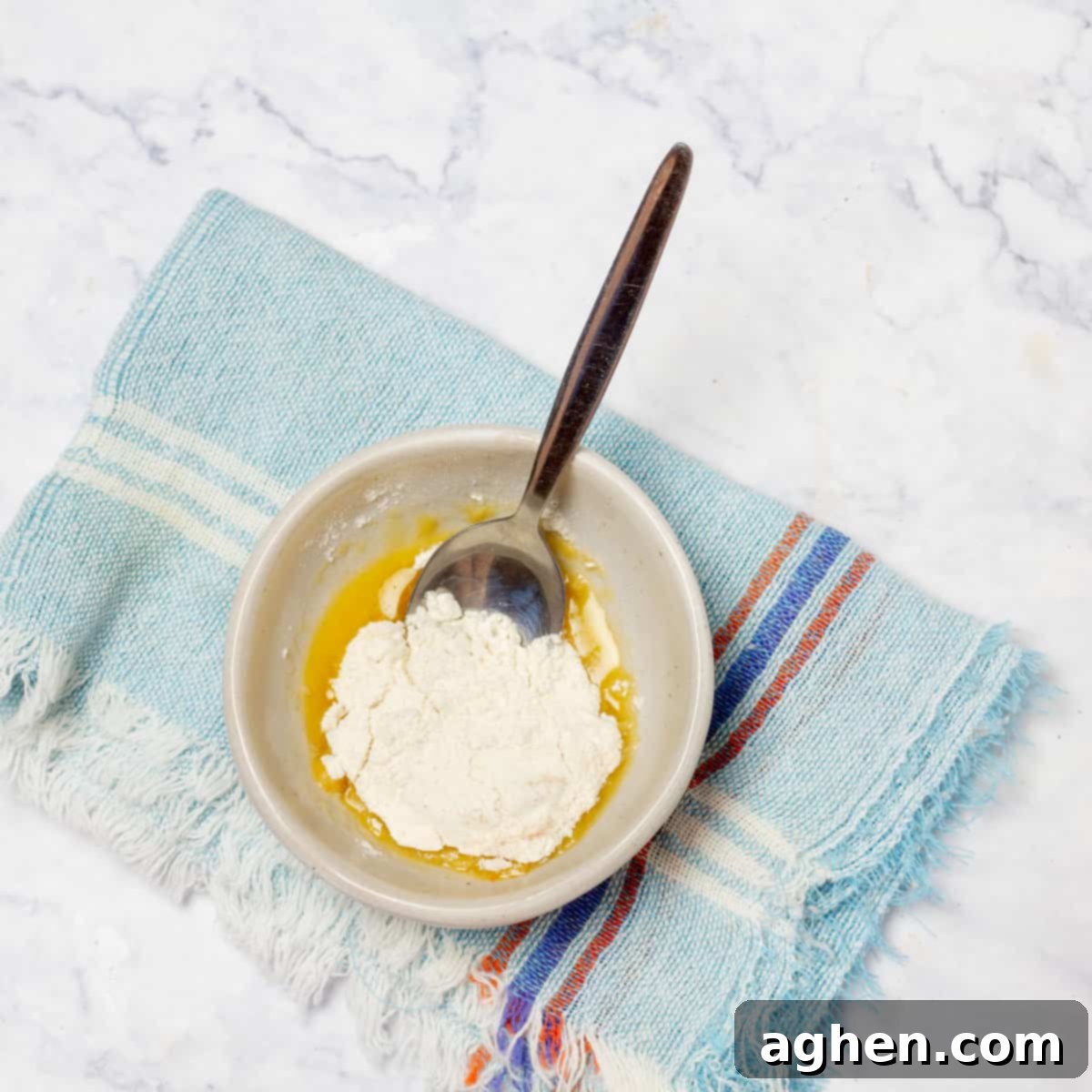 Juicy Instant Pot Pork Chops in Minutes 7 A small bowl with a butter-flour mixture (roux paste) ready to be added to the Instant Pot.
