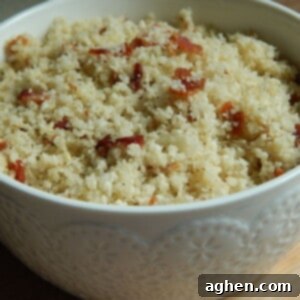 Crispy Bacon Cauliflower Fried Rice 2 Close-up of freshly prepared cauliflower fried rice with crispy bacon pieces