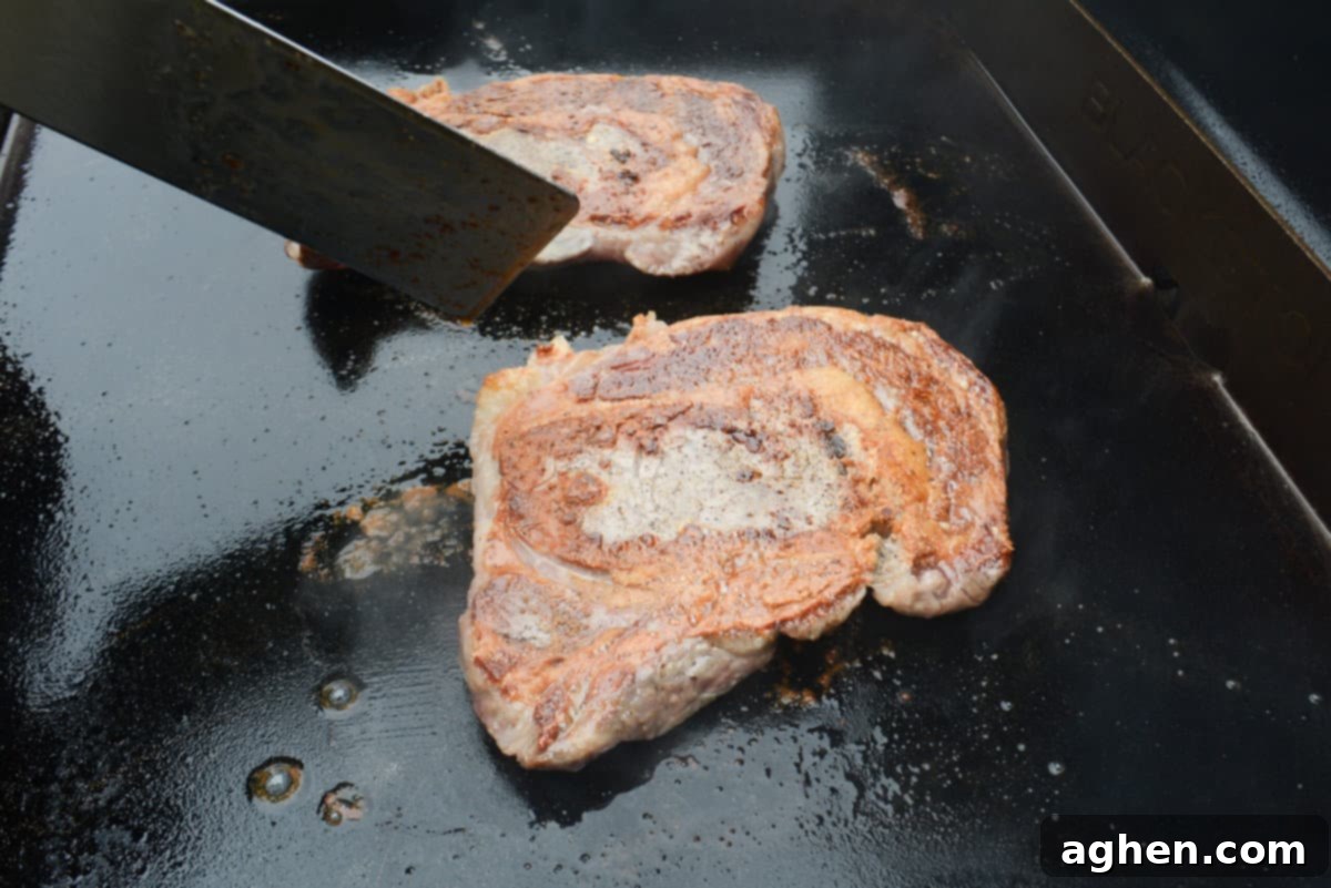 Mastering Steak on the Blackstone Griddle 6 flipped ribeye steaks, cooking on blackstone